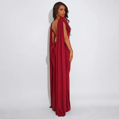 Red evening gown with open back on a white background