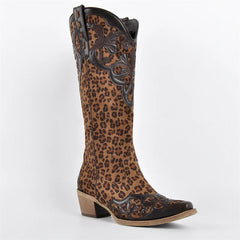 Leopard print knee-high boots with decorative overlays and a chunky heel