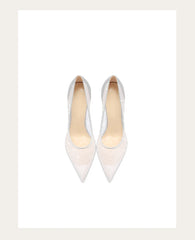 Pair of white high-heeled shoes on a light gray background