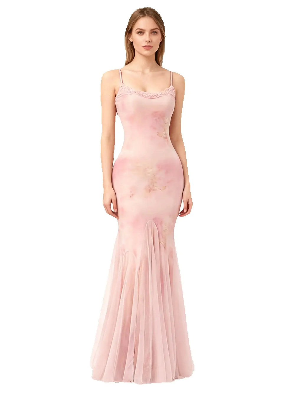 Model wearing a spaghetti strap lace trim fishtail tulle gown in a soft pink hue.