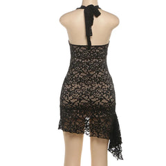 Black lace dress on a mannequin against a white background