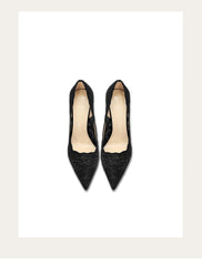 Pair of black high-heeled shoes on a white background