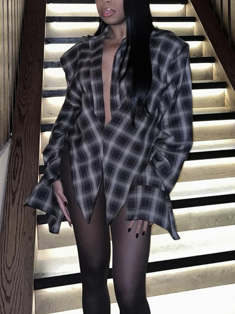 Close-up of the soft brown plaid fabric and collar detail