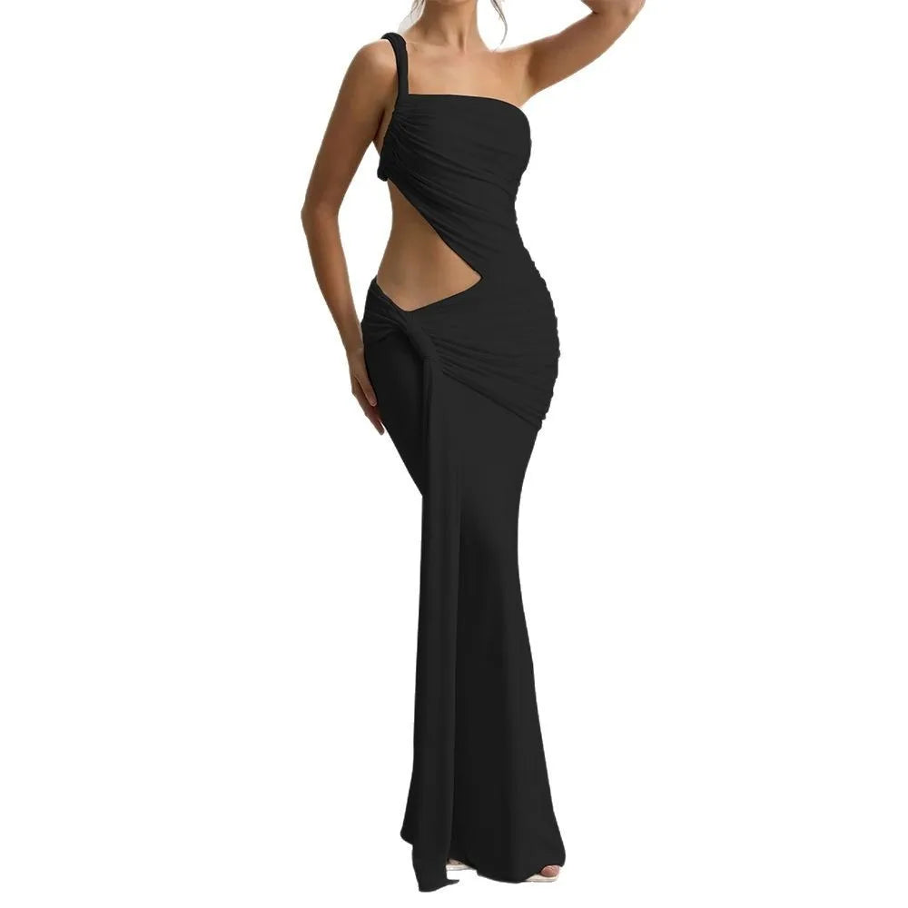 Black one-shoulder evening gown with cut-out design on a white background