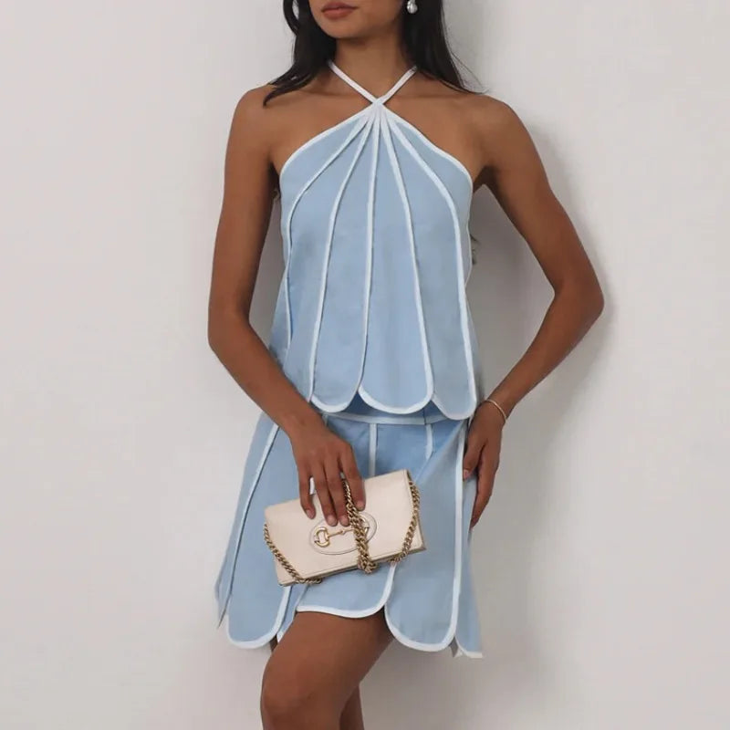 Close-up of petal trim halter crop top and flare mini skirt set