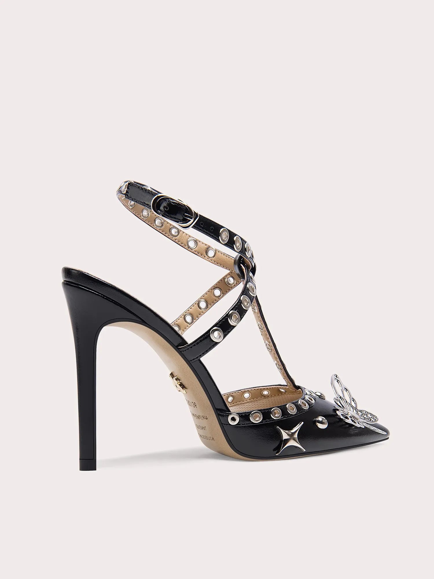Black high-heeled sandal with star and rhinestone details on a white background