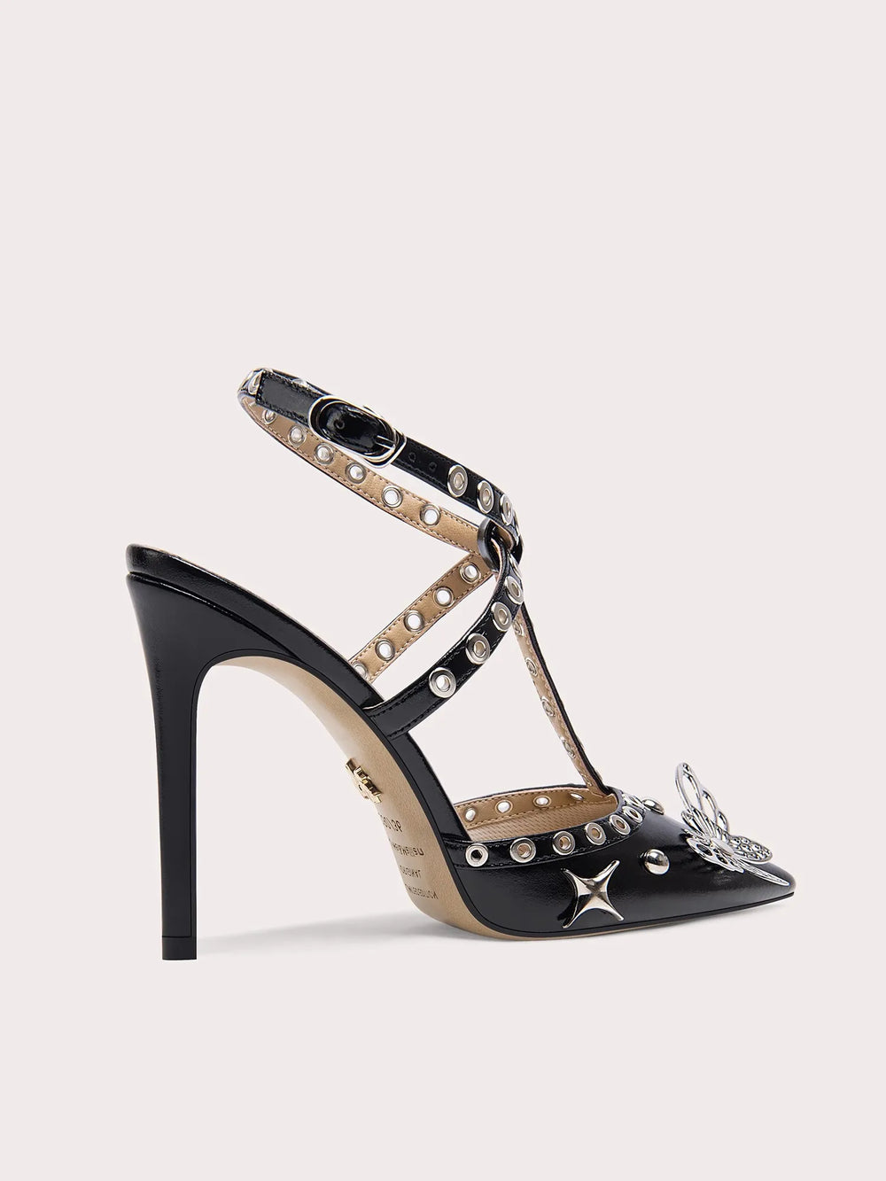 Black high-heeled sandal with star and rhinestone details on a white background