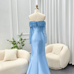 Light blue evening gown on a mannequin against a neutral background