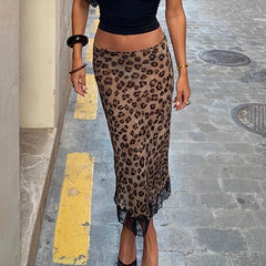 Model wearing a leopard print midi skirt with lace trim