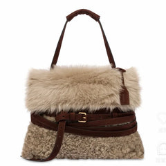 Front view of the plush fur belted messenger bag.