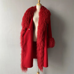 Red fur coat on a mannequin against a plain background