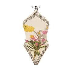 One-piece swimsuit with halter neckline and botanical print.