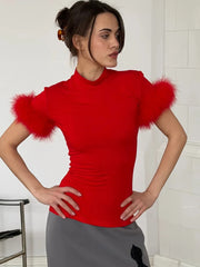 Red mock neck feather trim top