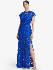 Blue floral appliqu� maxi dress with cap sleeves and high slit.