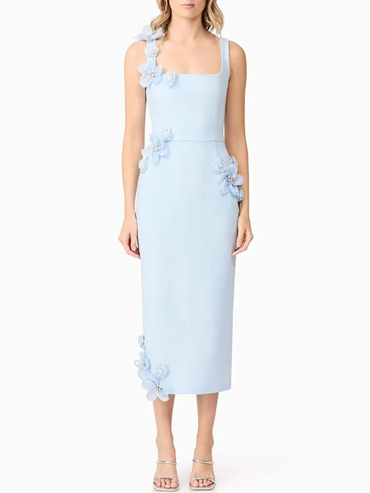 Light blue dress with floral details on a white background