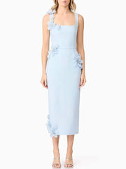 Light blue dress with floral details on a white background