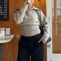 Detail shot of sweater hem and soft knit texture with gentle drape