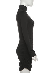 Black long-sleeve dress on a mannequin against a white background