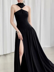 Black evening gown with a high slit