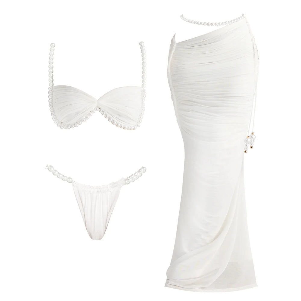 White bikini and ruched skirt with pearl embellishments