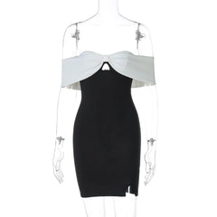 Black and white dress on a mannequin against a white background