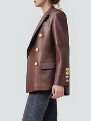 Brown leather blazer with gold buttons on a plain background