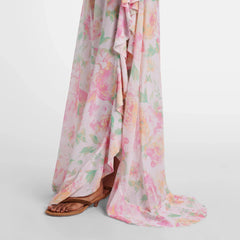 Close-up of the flowing ruffled maxi skirt with floral print.