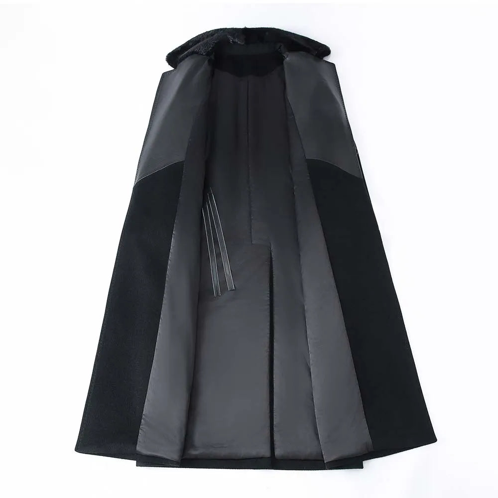 Black cape with a hood on a white background