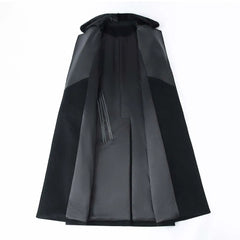 Black cape with a hood on a white background