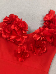 Red floral top on a light gray background