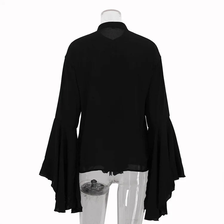 Black blouse with bell sleeves on a mannequin against a white background
