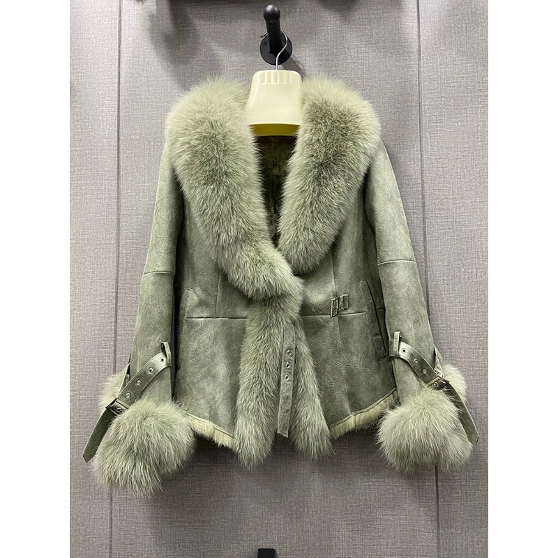 Light green shearling jacket with a sage green fox fur collar and cuffs.