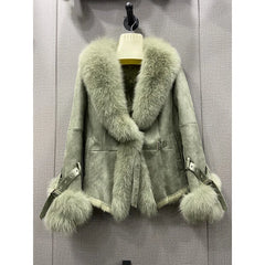 Light green shearling jacket with a sage green fox fur collar and cuffs.