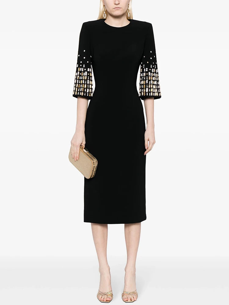 Black midi dress with embellished three-quarter sleeves and O-neckline