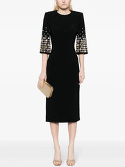 Black midi dress with embellished three-quarter sleeves and O-neckline