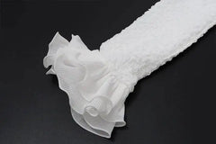 Close-up of a white textured fabric on a black background