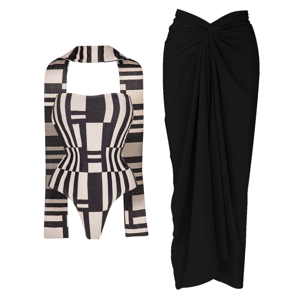Abstract geometric print swimsuit with a black draped maxi skirt