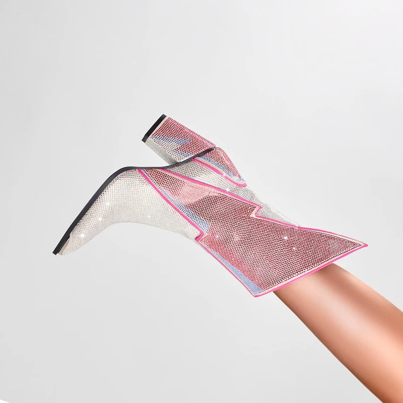 Top view of a crystal embellished lightning bolt mid-calf boot.