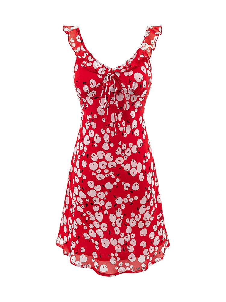 Red cherry print mini dress with ruffle straps and a tie V-neck, front view.