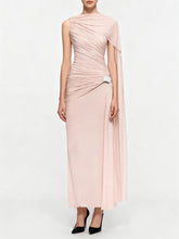 Woman wearing a pink one-shoulder dress on a white background
