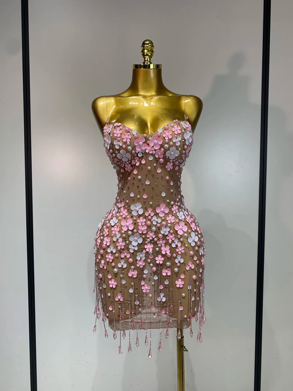 Appliqued flower mini dress, front view.