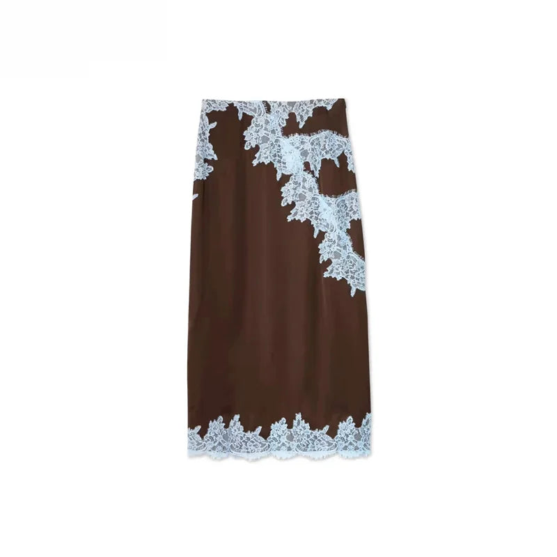 Brown skirt with white lace trim on a white background