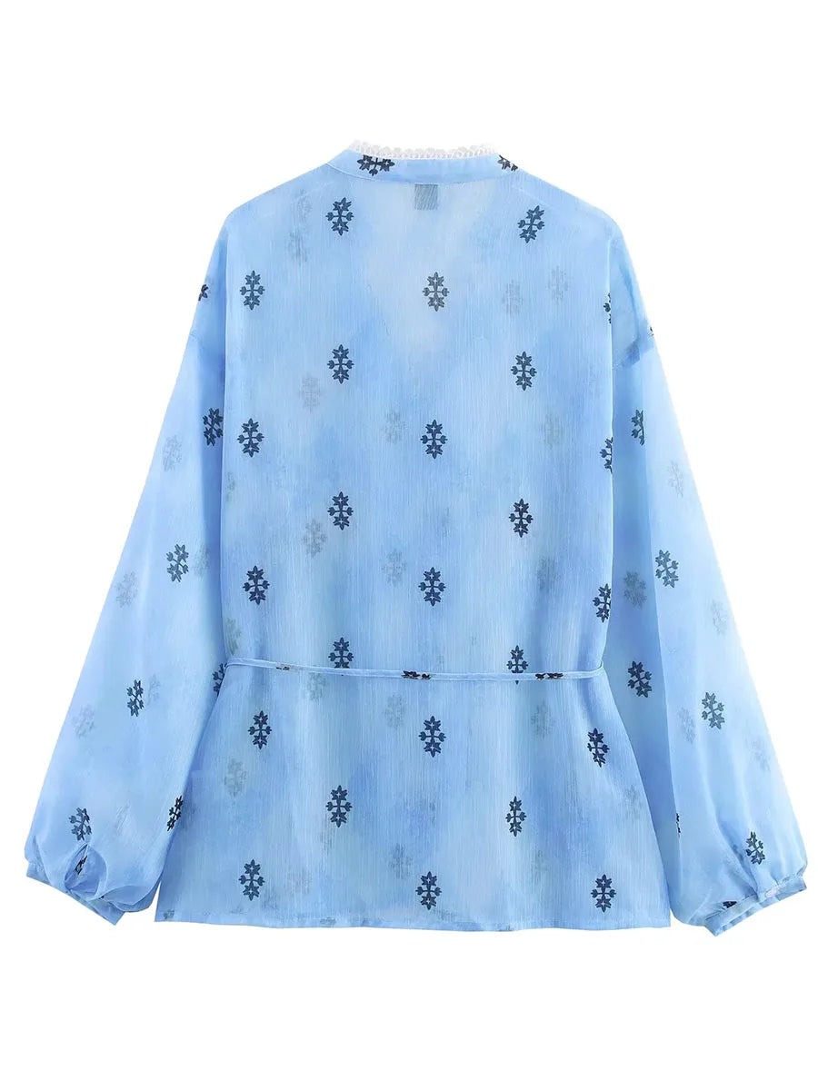 Light blue shirt with black floral pattern- back
