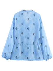 Light blue shirt with black floral pattern- back