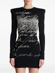 Beaded script long sleeve mini dress on mannequin