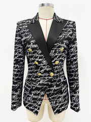 Love letter print double-breasted blazer on a mannequin.
