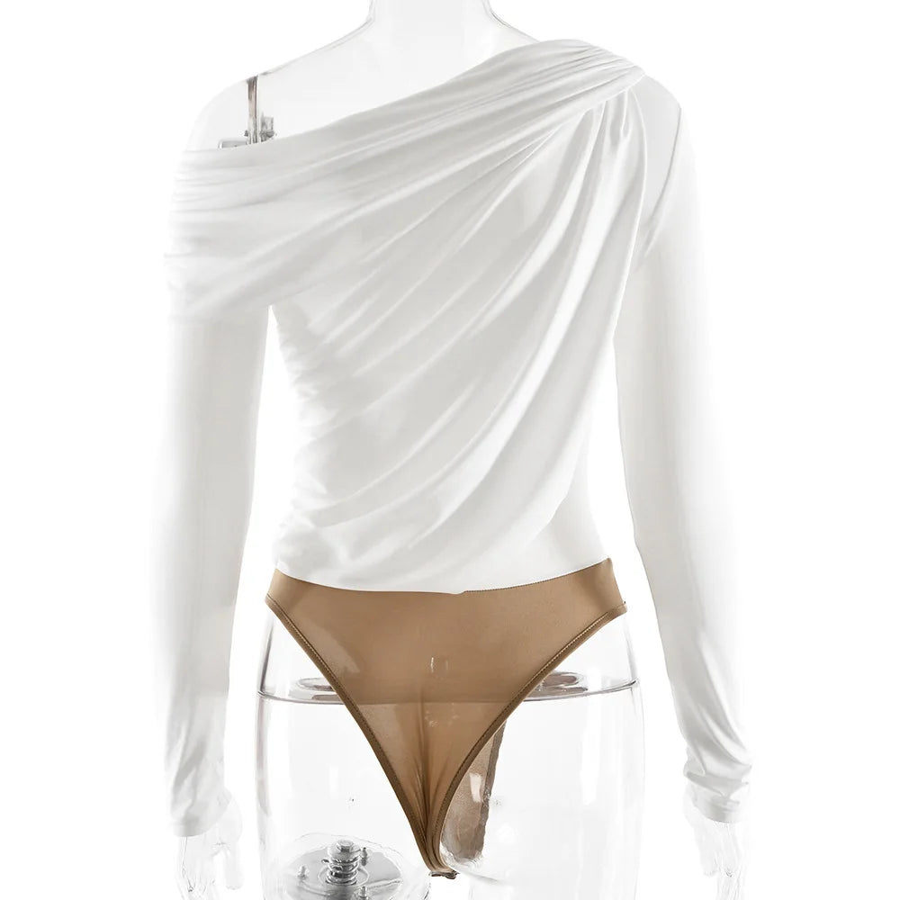 White long-sleeve top with draped design and beige underwear on a mannequin against a white background
