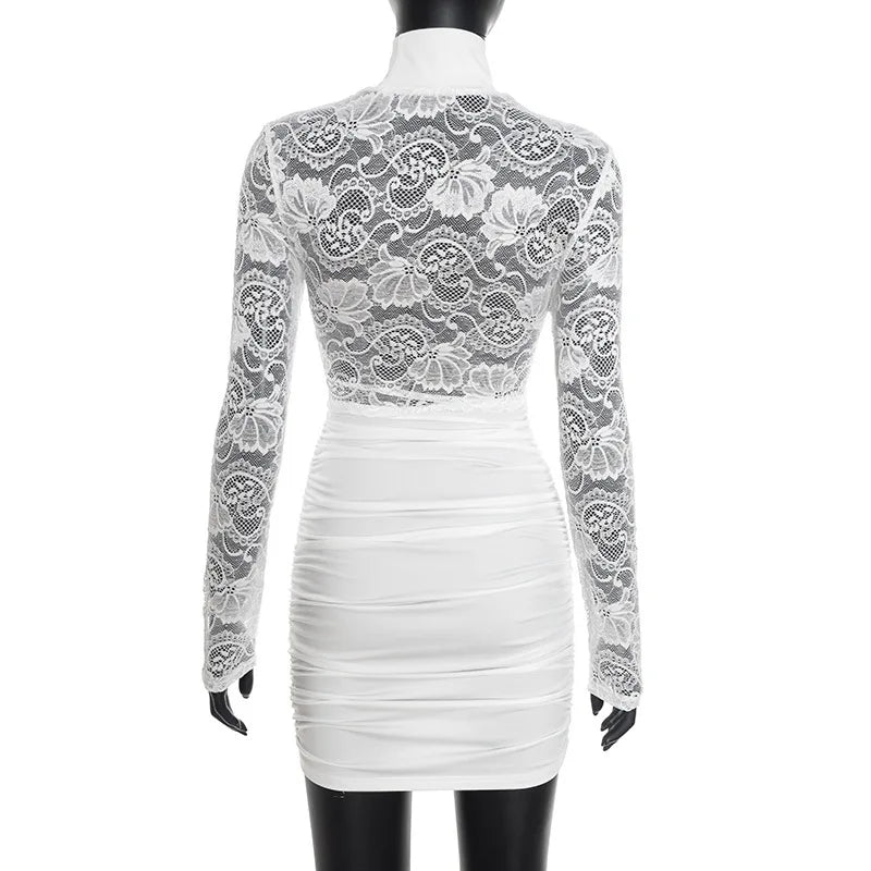 White lace dress on a mannequin against a white background