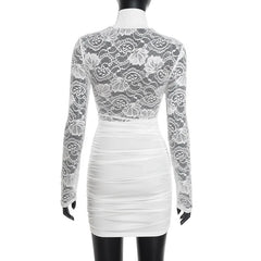 White lace dress on a mannequin against a white background