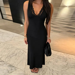 Close-up of black lace trimmed v-neck maxi dress